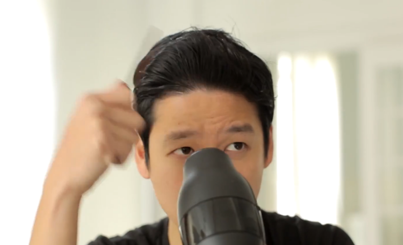 jeff chan blow dries his hair
