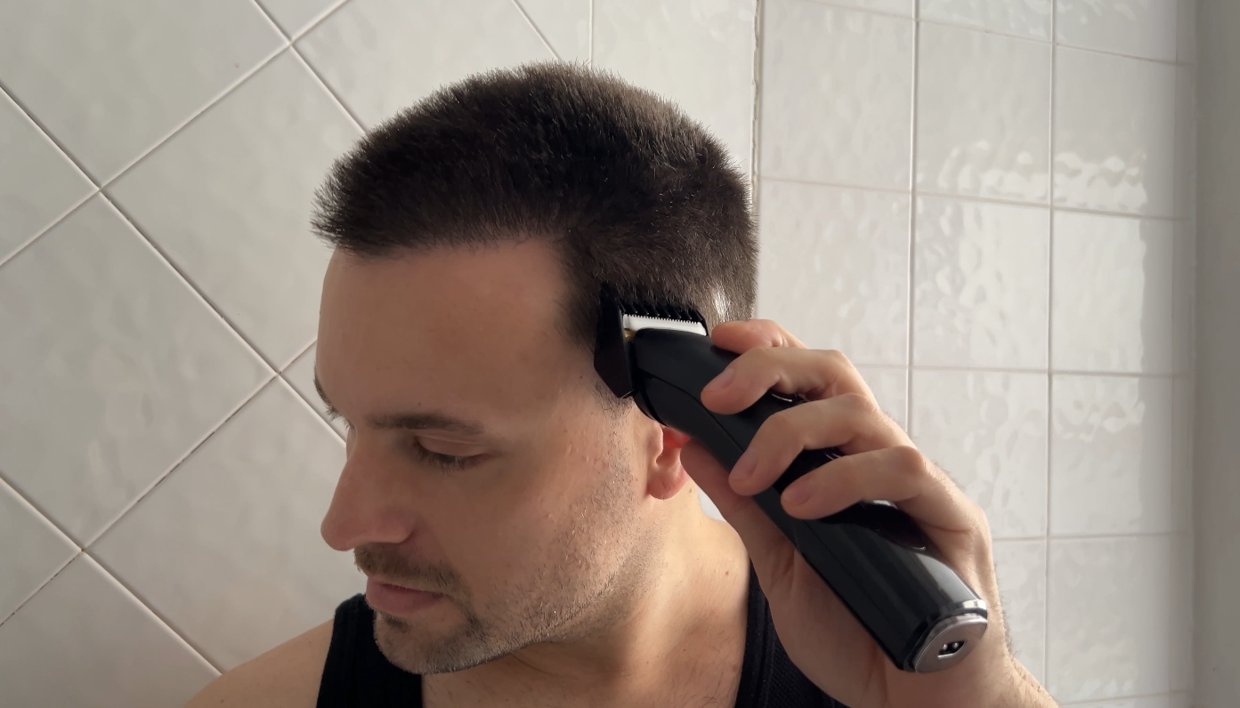 Adam using the Andis enVISION hair clipper.
