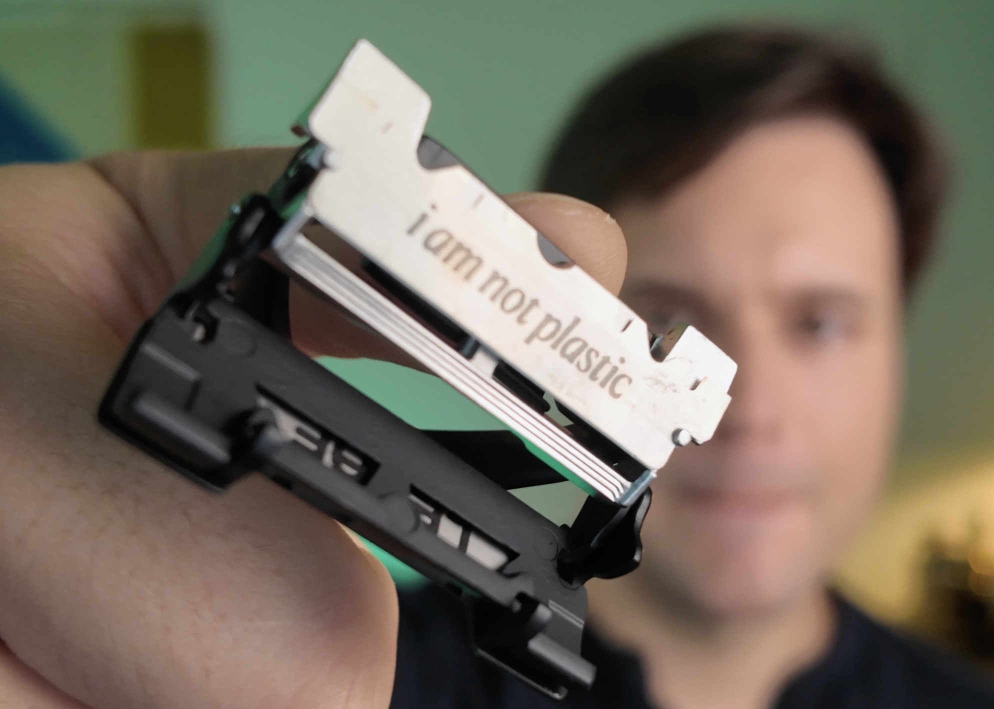 Showing how to load a blade atop the Leaf Two Razor